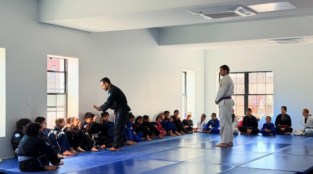 Kids and adults training martial arts at @JiuJitsuNYC in Queens